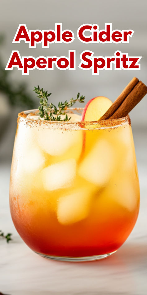 Apple Cider Aperol Spritz Apple Cider Spritz Cocktail, Rimmed Drinks, Christmas Champagne Cocktails, Cinnamon Sugar Rim, Aperol Spritz Recipe, Christmas Champagne, Spritz Recipe, Champagne Drinks, Champagne Cocktails