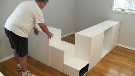 This man came up with a clever way to get bedroom storage with IKEA kitchen cabinets—and it looks SO amazing! Ikea Hack Lit, Platform Bed Diy, Ikea Platform Bed, Ikea Bed Hack, Farmhouse Headboard, Diy Platform Bed, Bed In Closet Ideas, Standard Kitchen, Ikea Kitchen Cabinets