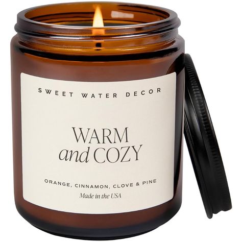 SMELLS LIKE - Let warm and inviting scent notes of orange peel, cinnamon, ginger, clove, cypress, vetiver, pine, and fir balsam fill your home this holiday season. This cozy winter candle will transform your space into a festive wonderland. It's the perfect fall to winter candle that can be enjoyed throughout the end of the year.
CANDLE INFO - 9oz Amber Candle Jar with Black Lid | Jar Size: 2.75 x 2.75 x 3.5" | 208g Net Weight | 40+ Hour Burn Time
CANDLE CARE - Trim your wick to 1/4" before candle is lit each time to prevent soot. Burn candle so wax pool reaches the jar edge each time to prevent wax tunneling. Burn candle no more than 4 hours at a time. Do not burn candle with less than a 1/2" of wax remaining. Keep candle away from fans, open windows, hot surfaces, children, pets. Clean Girl Must Haves, Water Candles, Fall Tray Decor, Fall Tray, Water Decor, Amber Candle, Sweet Water, Burning Candles, Cozy Candles