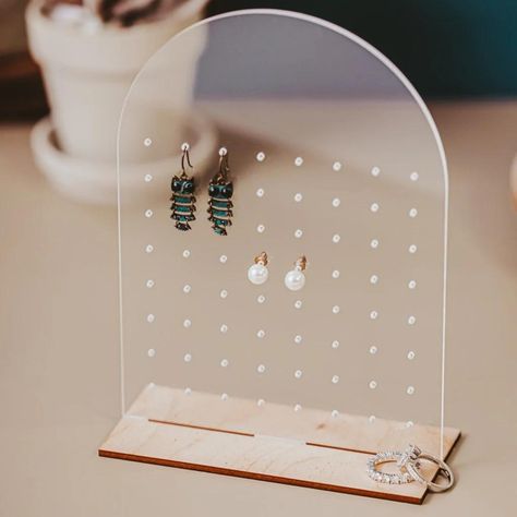 Keep your favorite pieces front and center with one of our sleek jewelry displays 😍 Our minimalist designs are perfect for organizing and showcasing your go-to earrings, making your morning routine a breeze! These displays are the perfect combination of stylish and functional. Grab one for your jewelry at shoplegacyandlight.com! ♡ ♡ ♡ #legacyandlight #shoplegacyandlight #smallbusinessowner #smallbusiness #handmade #handmadegifts #greenecountyva #ruckersvilleva #smallbusinesses #supportsma... Acrylic Earring Holder, Tangled Jewelry, Sleek Jewelry, Vanity Dresser, Earring Display Stands, Wooden Arch, Small Business Packaging Ideas, Jewelry Holders, Business Packaging