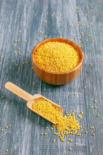 Free Photo | Free photo raw organic healthy millet Benefits Of Mustard, Curry Leaf Plant, Mustard Plant, Pearl Millet, Yellow Mustard Seeds, Organic Gifts, Middle Eastern Dishes, Mint Plants, Help Digestion