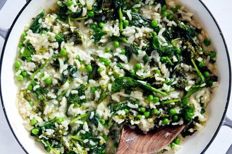 Baked Risotto With Greens and Peas Recipe - NYT Cooking Traditional Risotto, Baked Risotto, Cottage Cheese Pasta, Vegetarian Main Course, Kale And Spinach, Pea Recipes, Nyt Cooking, Risotto Recipes, Spinach And Cheese