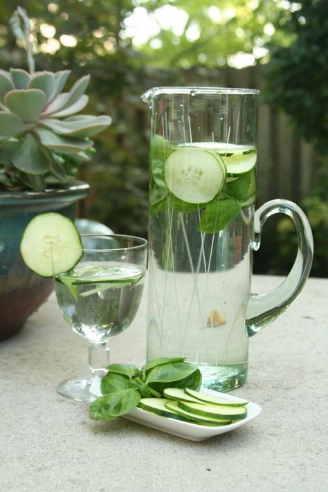 i'm currently obsessed with cucumber water.  This one includes basil in it which sounds nice but i have yet to try that. Cucumber Water Benefits, Basil Water, Cucumber Basil, Cucumber Lemon Water, Cucumber Detox Water, Sun Signs, Cucumber Water, Infused Water Recipes, Fruit Infused Water