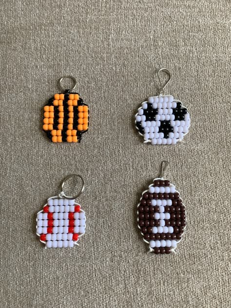 Creative Sports Crafts for Kids: Fun Projects for Little Athletes Soccer Ball Bead Pattern, Beaded Keychain Animals, Penguin Pony Bead Pattern, Football Jewelry Diy, Pony Bead Crafts Keychains Patterns, Pony Beads Keychains, Football Diy Crafts, Pony Bead Bracelets Patterns, Pony Bead Keychain Patterns