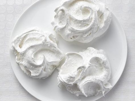 Get Meringue Clouds Recipe from Food Network.  This is a great meringue cookie!  HOWEVER, you can turn it in to MARSHMALLOW  MERINGUE  just by adding about a cup or so of marshmallow fluff!  ALSO, add a teaspoon of vanilla to make it even better!!! Meringue Clouds, Meringue Pavlova, Food Network Magazine, Meringue Cookies, Marshmallow Fluff, Plated Desserts, Neat Ideas, Kitchen Food, Food Magazine