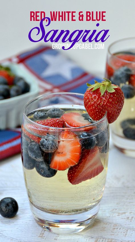 Easy White Wine Sangria Recipe, Easy White Wine Sangria, Red White And Blue Sangria, Blue Sangria, Wine Sangria Recipe, White Wine Sangria Recipe, Fourth Of July Drinks, White Wine Sangria, Wine Sangria