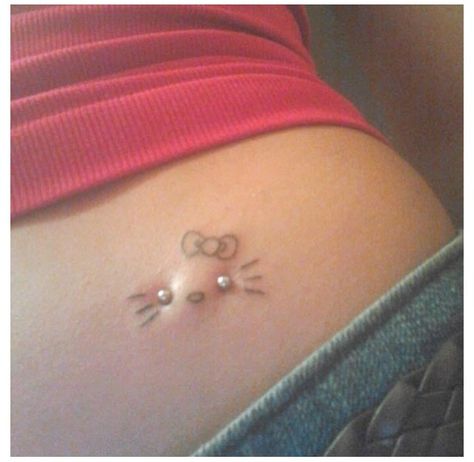 Dermal and Tattoo of Hello Kitty. I wouldn't get it but it's pretty KAWAII! Nip Piercings Barbell Hello Kitty, Dermal Tattoo, Chest Dermal Piercing, Hip Dermals, Chest Dermal, Back Dermals, Hip Dermal Piercing, Back Dermal Piercing, Face Dermal