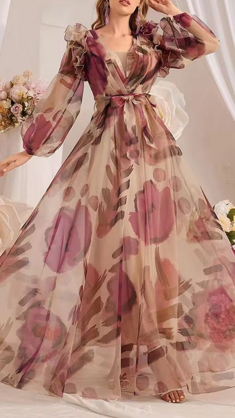 I recently saw this stunning floral printed lantern sleeve long dress with a ruffled hem, and I couldn't help but fall in love!   The flowy sleeves and delicate flowers create such a dreamy vibe. I can totally see myself twirling around at a summer picnic or brunch with friends.   What do you think? Would you rock this look? Let me know in the comments! 🌸👗✨   #FloralFashion #DressGoals #SummerStyle #FashionInspo #OOTD Flowy Dress Aesthetic, Floral Lantern, Sleeve Long Dress, Style Tutorial, Hijab Style Tutorial, Lantern Sleeve Dress, Flowy Sleeves, Dress Aesthetic, Delicate Flowers