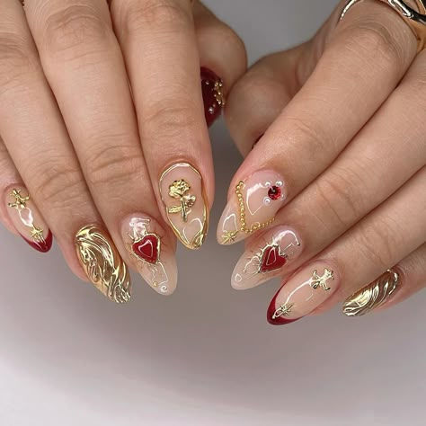 ⚜️ Golden hour ✨ ib from @colorspace_id 💛 ❤️ 𝗗𝗶𝘀𝗰𝗼𝘂𝗻𝘁 𝗖𝗼𝗱𝗲 at @kiokonailsupply use 𝗝𝗔𝗡𝗘𝗧 to save 💸 on your Korean gel / nail supplies ✨ #nailinspo #naildesign #rednails #maroonnails #fallnails #autumnnails #apresgelx #gelxnails #3dnails #chromenails #frenchnails #frenchtips #chromehearts Gold Glitter Nail Designs, Red And Golden Nails, Nails With Gold Charms, Gold Heart Nails, Nails Red And Gold, Golden Nails Designs, French Tips Nails, Fake Acrylic Nails, Press On Nails French