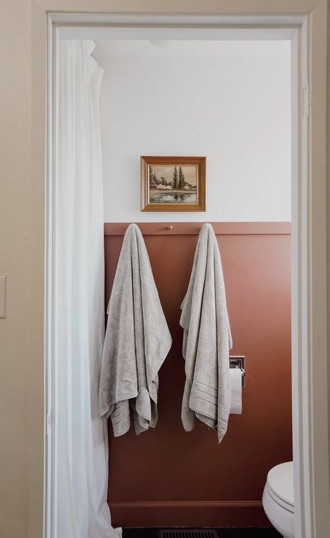 maroon painted bathroom - rebecca and genevieve No Reno Bathroom Makeover, Color Drenched Bathroom, Windowless Bathroom, Half Painted Walls, Black Door Knobs, Diy Fireplace Makeover, Hollow Core Doors, Bathroom Paint, Primary Bath