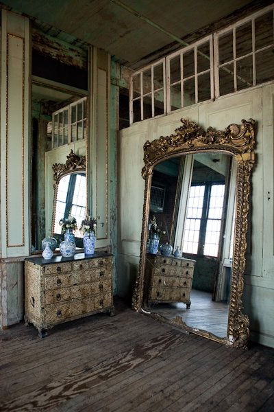 Likes: MIRRORS, openness, light, wood, aged building    Dislikes: vases ruin color scheme, dresser seems to old to be usable, dresser is even too ruined to be attractive Older Homes, Luxurious Homes, Huge Mirror, Sewing Shop, Decorative Styles, Porch Living, Celery Green, Big Mirror, Ornate Mirror