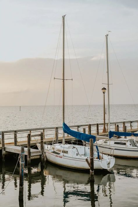 Fairhope is a delightful seaside resort situated on the picturesque shoreline of Mobile Bay. It offers a wide range of dining options, nature preserves, and numerous activities to explore during weekend or weeklong getaways with friends. Here's our ultimate girls' getaway guide to Fairhope, Alabama with all the tips you need to plan an unforgettable girls' trip! Boat On Sea, Fairhope Alabama, Fairhope Al, Blue Boat, Local Brewery, Girls Getaway, Morning Dew, Seaside Resort, Nature Preserve