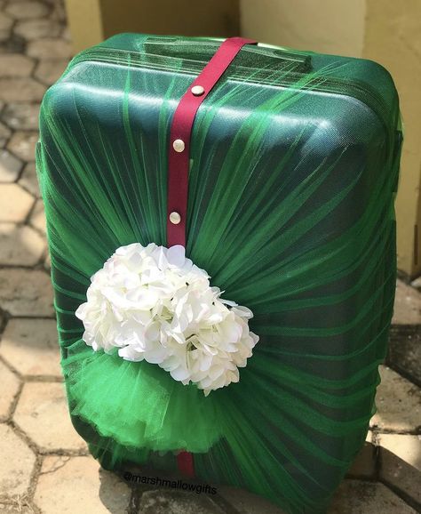 Suitcase wrapped with green net and burgudny ribbon for engagement dowry wrapping. Entrepreneur Infographic, Bridal Boxes, Bridal Gift Wrapping Ideas, Latest Bridal Mehndi Designs, Wedding Gifts Packaging, Suitcase Packing, Bridal Mehndi Designs, Tall Centerpieces, Bridal Mehndi