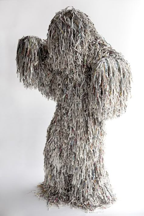 Paper ghillie Sculpture Out Of Recycled Materials, Shredded Paper Art, Sculpture Costume, Newspaper Costume, Animal Sculptures Recycled, Trash Sculpture, Wolf Cardboard Sculpture, Paper Monster, Trash Animal Sculptures