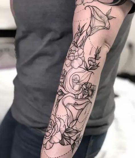 Calla Lily tattoos hold deep meanings and we've got an amazing collection of 105+ flawless designs to help you find the perfect one! 🌺💫 Express your unique style and beauty with these stunning floral tattoos. #CallaLilyTattoo #FloralInk #TattooInspo Calla Lily Tattoo, Lily Tattoo Meaning, Tulip Tattoo, Flower Sleeve, Bicep Tattoo, Lily Tattoo, Forearm Tattoo, Half Sleeve Tattoo, S Tattoo