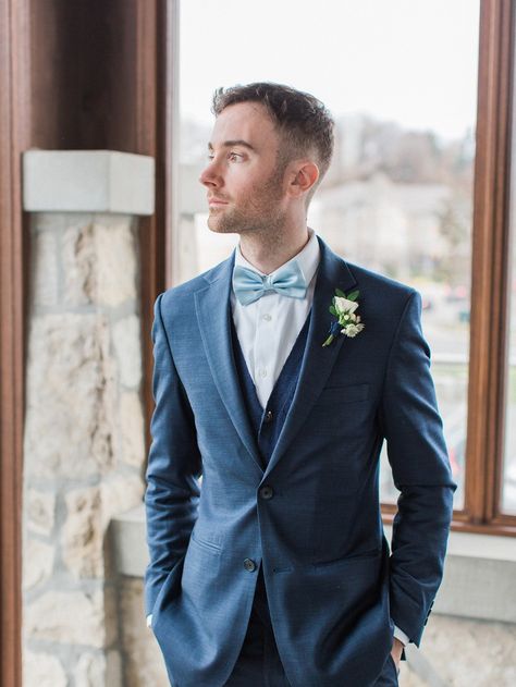 groom in navy blue suite and soft blue bow tie Blue Suit With Bow Tie Wedding, Navy Suit Bow Tie, Groom Suit Bow Tie, Blue Suit Bow Tie, Colombia Wedding, Men Suits Blue, Blue Groomsmen, Navy Suit Wedding, Navy Groom