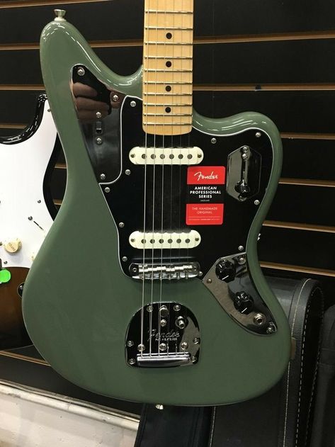 Jaguar Guitar Aesthetic, Dark Green Electric Guitar, Pretty Guitars Electric, Cool Guitar Straps, Bass Guitar Aesthetic, Olive Aesthetic, Electric Guitar Fender, Jaguar Guitar, Green Electric Guitar