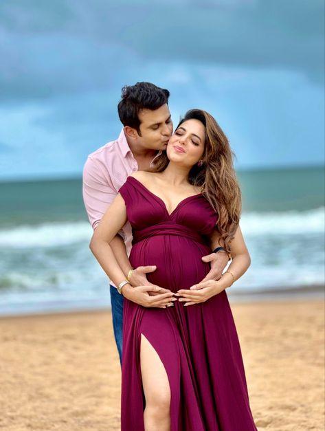 Maternity photoshoot , wine coloured high slit gown Babymoon Photoshoot Ideas, Maternity Photoshoot On Beach, Maternity Shoot At The Beach, Pregnancy Shoot Beach, Pregnancy Beach Photoshoot, Maternity Photo Shoot Ideas Beach, Pregnancy Photos Beach, Beach Pregnancy Photoshoot, Beach Maternity Photos Couples