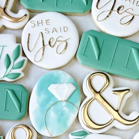 Baked by Becca on Instagram: "She said YES! These beauties are headed on a plane to NY right now & I wish I was with them🤍🥂💍  #engagementcookies #weddingcookies #bridalshowercookies #proposalcookies #ringcookies #friscocookies #prospercookies #planocookies #mckinneycookies" She Said Yes Cookies Decorated, She Said Yes Cookies Engagement, Engagement Decorated Cookies, She Said Yes Cookies, Engagement Party Cookies, Knot Cookies, Wedding Shower Cookies, Engagement Cookies, Party Cookies