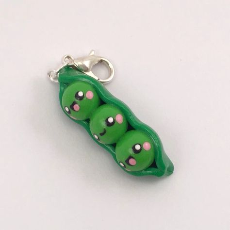 Peas in a pod charm polymer clay, Pea pod, Peapod charm, Kawaii charm, miniature food, clay jewellery, clay jewelry by JigglesAndBeans on Etsy (null) Three Peas In A Pod, Food Clay, Chain Keychain, Peas In A Pod, Pea Pods, Clay Jewellery, Stitch Marker, Clay Charms, Clay Ideas