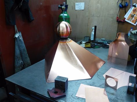 Bespoke copper finial with skirt for a customers summerhouse.  Finials can be produced to virtually any design in Copper, Stainless Steel and GRP.  https://www.clockscupolasandweathervanes.co.uk/bespoke-metal-finials  #coppersmiths #copperfinial #decorativerooffinial Chimney Design Ideas, Spanish House Exterior, Wood Stove Chimney, Fireplace Vent, Chimney Caps, Metal Shingles, Chimney Design, Copper Gutters, Chimney Cleaning