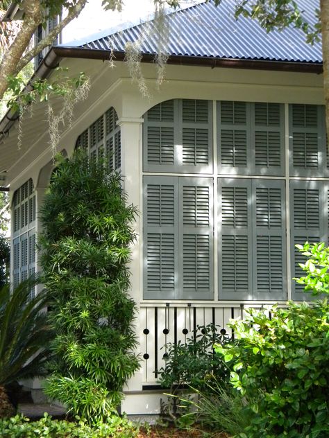 Southern Covered Porch, Screened In Porch With Shutters, Porch Shutters For Privacy, Houses With Shutters Exterior, Deck Shutters, Porch Privacy Ideas, Porch Shutters, Louvered Wall, Privacy From Neighbors