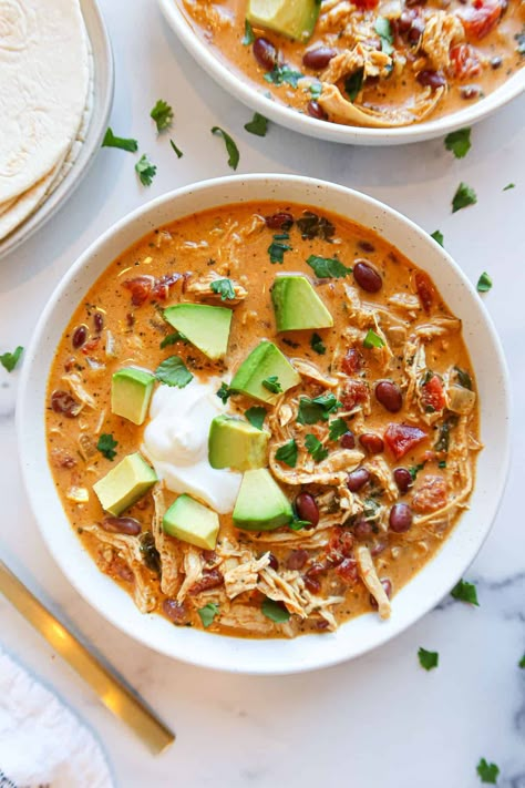 Delicious, creamy taco soup is made with just ten simple ingredients. You'll only need one pot and 30 minutes to whip it up! The perfect, quick and easy dinner for a busy weeknight. Taco Soup With Rotel, Soup With Rotel, Low Carb Easy Dinner, Creamy Chicken Taco Soup, Healthy Taco Soup, Creamy Taco Soup, Healthy Taco, Make Shredded Chicken, Authentic Mexican Recipes