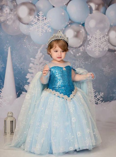 This beautiful slightly below the knee dress is made with extremely soft glittery tulle and lined from top to bottom with cotton perfect for baby and children sensitive skin. Each dress comes with a matching headband and a cape. Pre-Order: Ships in 3-4 weeks. Need Something Different Or Different Color? WhatsApp: 16314885153 Call: 1(888) 381-3742 This dress can be custom made up to age 12 years. ... daha fazla Elsa Birthday Dress, Event Clothes, Below The Knee Dress, Frocks For Kids, Princess Birthday Party Decorations, Frozen Birthday Theme, Frozen Dress, Simple Frock Design, Angel Kids