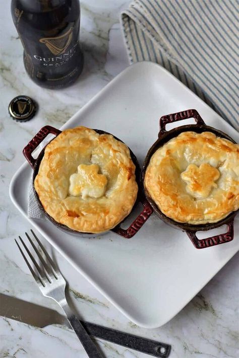 Along with staples like corned beef and cabbage, soda bread, and colcannon, this Irish Steak and Guinness Pie has become one of our favorite St. Patrick’s Day recipes. Tender morsels of steak are combined with sautéed root veggies and mushrooms in an Irish stout and beef sauce before being sealed up and baked with a flaky and buttery puff pastry crust. Making the Irish Beef and Stout Pie Gather your ingredientsTo make the Beef and Guinness pie you will need the following ingredient… Traditional Irish Cottage Pie, Irish Meat Pie, Irish Entrees, Irish Christmas Desserts, Irish Pie, Savory Hand Pies Recipes, Steak And Guinness Pie, Pie Savory, Beef And Guinness Pie