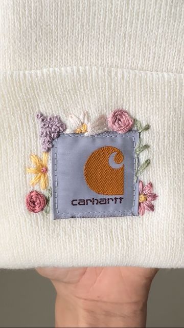 Carhart Embroidery Hat, How To Embroider A Beanie, Hand Embroidery Inspiration Clothing, How To Embroider Carhartt Beanie, Hand Embroidery Carhartt Beanie, Embroidery On Carhartt Hat, Carhartt Beanie Embroidery Flowers, Embroider Clothes Diy Hand Embroidery, Hand Embroidery Beanie