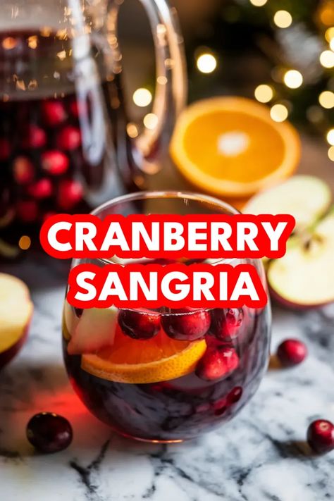 A photo of a  Cranberry Sangria a Cranberry Cocktails Cranberry Sangria Punch, Cranberry Wine Punch, Cranberry Sangria Recipes, Chardonnay Cocktails, Sangria Vodka Recipe, Cranberry Cocktails, Christmas Sangria Recipes, Cranberry Cocktail Recipe, Cocktail Cart