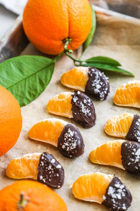 Chocolate Covered Oranges are a classic combination of juicy orange slices and rich chocolate topped with flaky sea salt. This healthy treat will satisfy your sweet tooth and is quick and easy to make! These delicious treats are also highly customizable by adding your favorite toppings or swapping in your favorite chocolate. Make them with clementines for small bite size pieces, larger orange slices for something more substantial, or candied oranges for a fun snack! Candied Oranges, Over Easy Eggs, Juicy Orange, Healthy Treat, Easy Eggs, Chocolate Topping, Chocolate Drizzle, Chocolate Orange, Small Bites