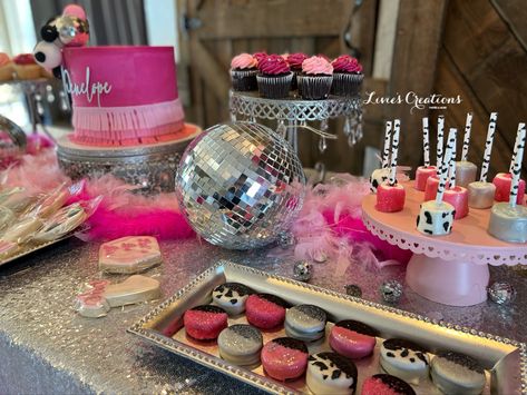 Treat table for a disco cowgirl 1st birthday Disco Cowgirl Pinata, Western Disco Birthday Cake, Cowgirl Treat Table, Cowgirl B Day Party, Disco Cowgirl Dessert, Disco Cowgirl 21st Party, Disco Party Treat Table, Last Rodeo Bachelorette Cake, Disco Cowgirl Table Decorations