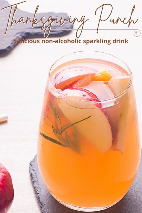 Cozy up with a glass of this Thanksgiving Punch! It's a fruity holiday drink that is perfect for holiday gatherings with friends and family. Thanksgiving Drinks Non Alcoholic For A Crowd, Nonalcoholic Thanksgiving Punch, Thanksgiving Punch With Sherbert, Kid Friendly Thanksgiving Drinks, Thanksgiving Punch Non Alcoholic Apple Cider, Holiday Punch Non Alcoholic Thanksgiving, Thanksgiving Drink Station Ideas, Thanksgiving Cranberry Punch, Thanksgiving Kid Drinks