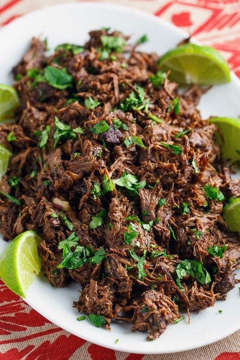 Barbacoa Tacos - making this tonight. Used less chipotle chilies because I want my baby boy to be able to eat it. I'll let you all know how it turns out. Doing in the slow cooker and browned the meat before hand. Smells amazing!! Beef Carnitas, Barbacoa Tacos, Carne Asada Tacos, Barbacoa Beef, Smoked Meat, Hispanic Food, Shredded Beef, Latin Food, Carne Asada