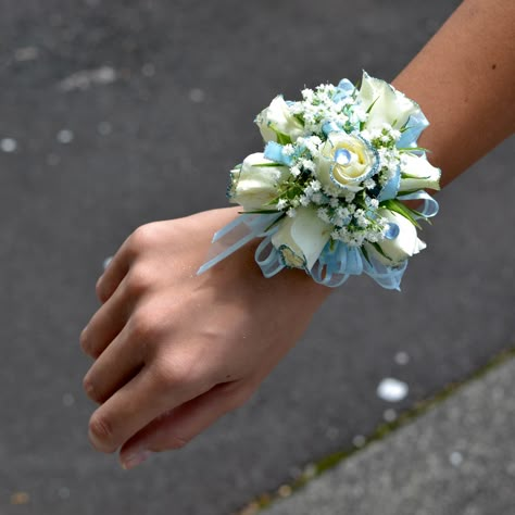 Baby Blue Wristlet   Kui & I Florist, LLC Hilo, Hawaii kuiandiflorist.com #kuiandi # prom2016 #roses Periwinkle Corsage, Light Blue Prom Corsage, Light Blue And White Corsage, Dusty Blue Corsage, Light Blue Boutonniere Prom, Corsage Light Blue, Baby Blue Corsage And Boutonniere, Corsage For Light Blue Dress, Corsage For Blue Dress