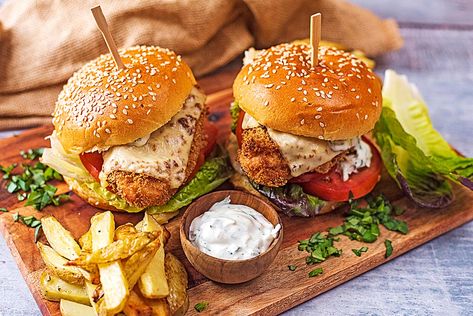 Baked Chicken Burger with Creamy Basil Sauce - Hungry Healthy Happy Burger In Oven, Chicken Schnitzel Burger, Gourmet Chicken Burgers, Pesto Chicken Burgers, Crunchy Chicken Burger, Burgers In The Oven, Homemade Chicken Burgers, Amylu Chicken Burger, Chicken Burger Patties