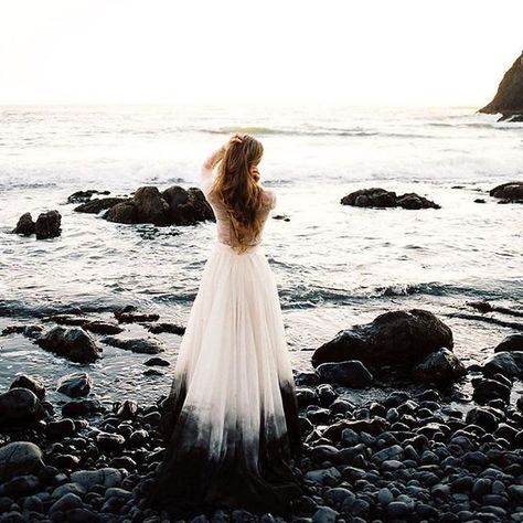 Dark Romance 🌙✨ // Cordelia skirt in Caviar + Savannah top // shop link in profile //Photography: @mylynwoodphoto | Dress: @sweetcarolinestyles | Videography: @huntinggroundfilms | Floral Design: @goodseedfloral |Details: Regina Studios | Model: @ms_model_heidi HAMU: @katblackmakeup Location: Newport, OR Yachats Lighthouse Dip Dyed Wedding Dress, Dyed Wedding Dress, Wedding Dress Ombre, Wedding Dress Two Piece, Ombre Wedding Dress, Profile Photography, Bridal Skirt, Two Piece Wedding Dress, Ombre Wedding