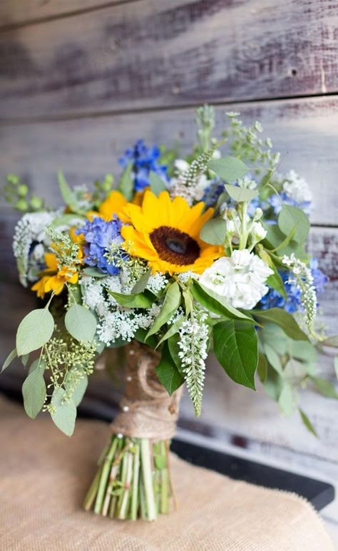 With most endeavors in life there is a form of balance, including decisions on your wedding flowers. Wedding flowers make up a large part... Eucalyptus Wedding Bouquet, Wedding Flowers Sunflowers, Rustic Summer Wedding, Sunflower Wedding Bouquet, Sunflower Themed Wedding, Rustic Bouquet, Prom Flowers, Sunflower Bouquets, Wedding Palette