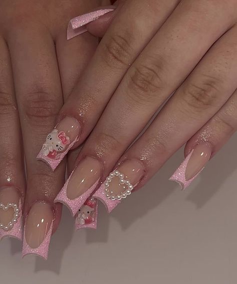 Valentine’s Day Nail Ideas Pink, Hello Kitty Nails Valentines, Hello Kitty Valentine’s Day Nails, Hello Kitty Valentine Nails, Acrylic Nail Designs Charms, Valentines Day Nails Hello Kitty, Hello Kitty Valentines Nails, Almond Shaped Valentines Day Nails, Pink Valentines Day Nails Short