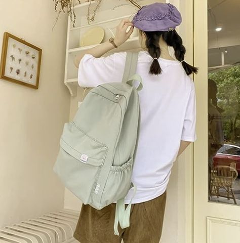 Material: Waterproff canvas material. Lightweight and durable to use. It is also easy to clean. Aesthetic Pastel Color: We choose cute pastel color, like pastel pink, sage green. Our backpack is eyecatching and unique. Dimension:The size of our backpack is 43*29*13cm/16.53"*11.42"*5.12" (H*L*W). Friendly to your 14/15'' laptop. Sage Green Backpack, Backpack Aesthetic, Green Backpack, Cute School Bags, Aesthetic Backpack, Kawaii Backpack, Green Backpacks, Backpack For School, Chest Bag Men