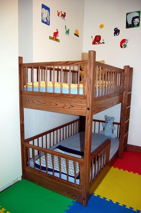 Recently I came across the image above of small bunk beds in the shared bedroom of 4-year-old twins and realized I'd never seen mini bunks like this. They are the same size as a toddler bed (i.e. the size of a crib mattress) and offer a stop-gap solution for parents looking to eke out another year or two in their current space. Small Bunk Beds, Bunk Beds For Girls Room, Ikea Bunk Bed, Bunk Beds Small Room, Bunk Beds For Boys Room, Bunk Bed Safety, Bed For Girls Room, Bunk Beds Boys, Girls Bunk Beds