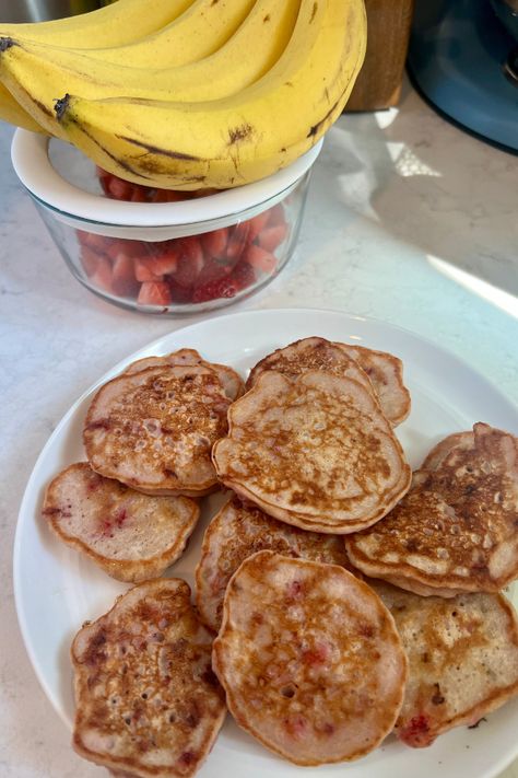 Strawberry Banana Pancakes - Messy Bun Motherhood Banana Strawberry Pancakes, Messy Bun Motherhood, 6 Month Old Pancakes, Strawberry Banana Pancakes For Baby, Avocado Banana Pancakes, Blw Muffins, Banana Pancakes For Baby, 7 Month Old Baby Food, Avocado Baby Food