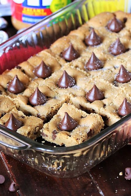 Peanut Butter Blossom Cookie Bars, Pretty Desserts For A Crowd, Sheet Pan Peanut Butter Blossoms, Peanut Butter Cookie Dough Bars, Easter Bar Recipes, But Goodie Bar, Sheet Pan Peanut Butter Bars, Easy Pitch In Desserts, Peanut Butter Blossoms Bars