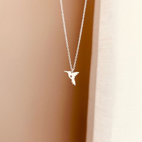 A hummingbird is so many things in so many ways. It is a bringer of joy, luck, hope, comfort, love, appreciation, enjoyment, independence, freedom, and optimism. Hummingbird Jewelry, Hummingbird Necklace, Summer Bracelet, Bird Necklace, Summer Bracelets, Minimal Jewelry, Necklace Dainty, Dainty Jewelry, Dream Closet