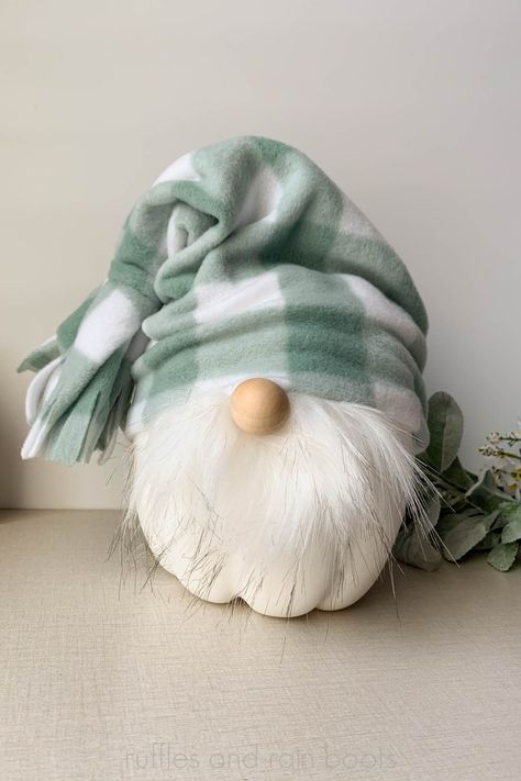 Cute white pumpkin with a gnome beard and no sew fleece gnome hat pattern on a linen background with small flowers and lambs ear accents. Pumpkin Gnome Diy, Pumpkin Gnomes Diy, No Sew Gnome Hat, Diy Gnome Hat, Gnome Hats Diy Free Pattern, Gnome Hat Pattern, Pastel Fall Decor, Swedish Gnomes, Gnome Beard