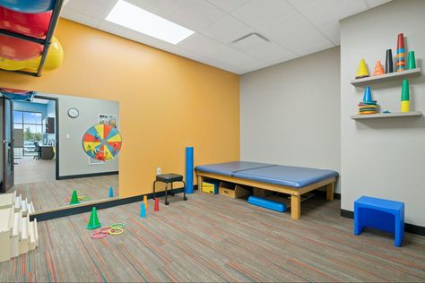 Pediatric physical therapy experts at Westside Children's Therapy in Illinois give an in-depth view of what PT sessions looks like for children in this article. Pediatric Physiotherapy Room, Pediatric Physical Therapy Equipment, Pediatric Therapy Gym Design, Pediatric Physical Therapy Clinic Design, Cheer Clinic Ideas, Pediatric Therapy Clinic Design, Physical Therapy Room, Therapy Room Design, Occupational Therapy Room