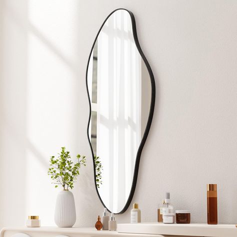 PRICES MAY VARY. MODERN INSPIRED DESIGN - Our irregular wall mirrors are framed in a slim, modern-style aluminum alloy, the irregular shape distinguishes it from traditional wall mirrors, making it a perfect complement to a modern, refined space PREMIUM QUALITY - The asymmetrical wall mirror is crafted with attention to detail, from the selection of materials to the manufacturing process, ensuring a high-quality and long-lasting product. The aluminum frame ensures durability and texture while ma Mirror Wall Living Room, Minimalist Apartment, Living Room Mirrors, Framed Mirror Wall, Wall Mounted Mirror, Mirror Designs, Creative Decor, Mirror Decor, Black Frame