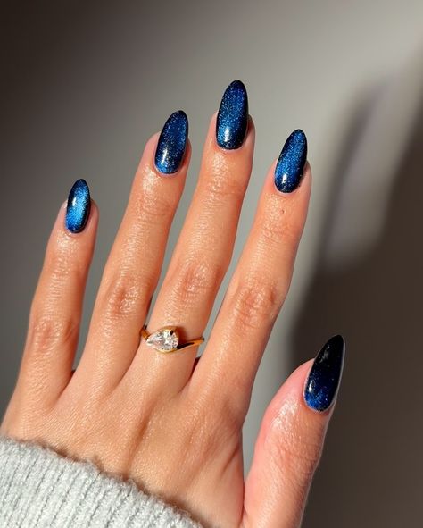 🌌🌌🌌 • @gelcare.official Patent Leather Black Midnight Velvet Sapphire • • • #nails #almondnails #bluenails #winternails #gelnails #naturalnails #gelcare #nailinspo Navy Chrome Nails Almond, Midnight Blue And Black Nails, Sapphire Chrome Nails, Winter Nail Designs Black, Midnight Blue Cat Eye Nails, Glass Sapphire Nails, Midnight Rain Nails, Blue Sapphire Nails, Navy Cat Eye Nails