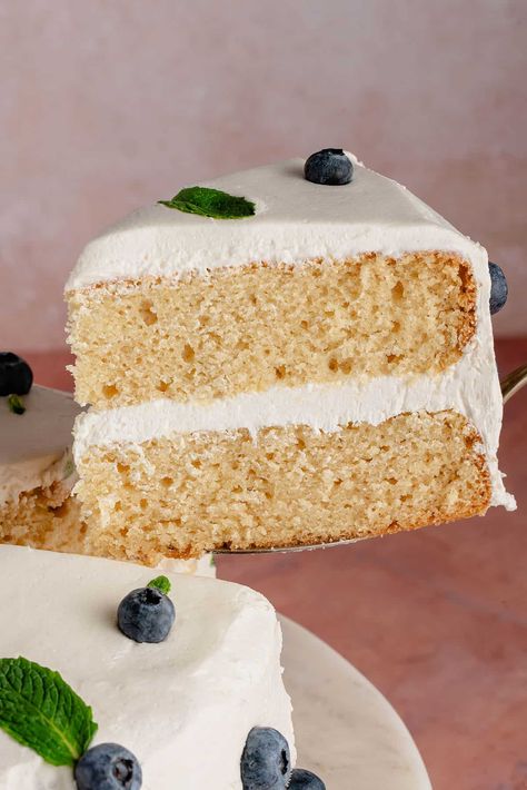 Making the Ultimate Vegan Vanilla Cake with a tender crumb, rich vegan buttercream frosting, and tons of pure vanilla flavor is easy enough for even the most novice home bakers! All you need is 10 simple ingredients and a reason to celebrate.  #cake #birthdaycake #dessert #sweet #celebration #vegan #buttercream #sweetsimplevegan #recipe